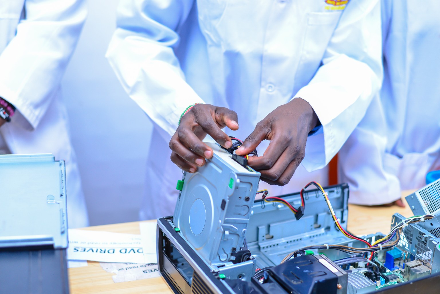 Computer hardware practical session involving equipment and internal components